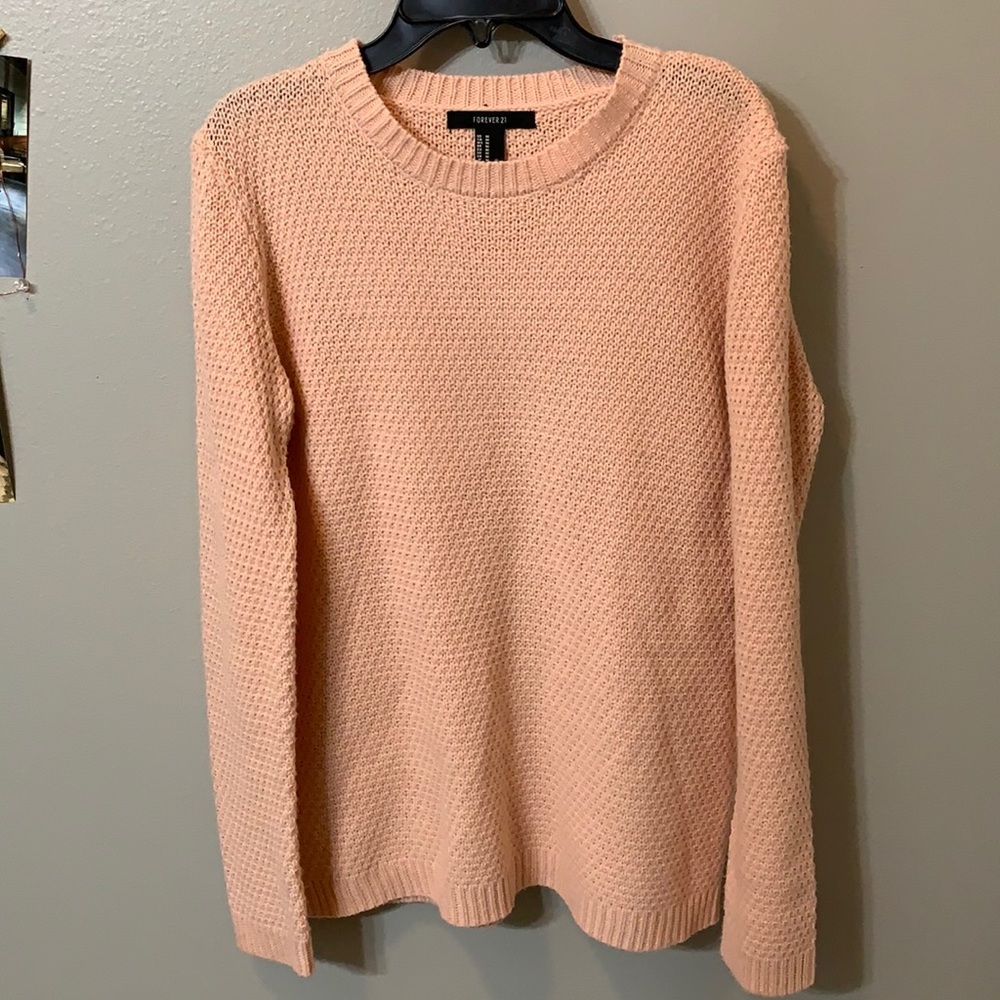light pink sweater